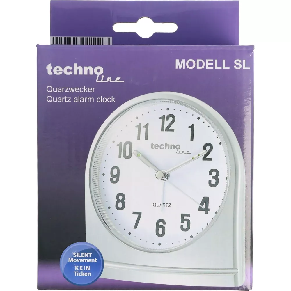 Verpackung eines Techno Line Quarz-Weckers mit Zifferblatt und Zeigern.