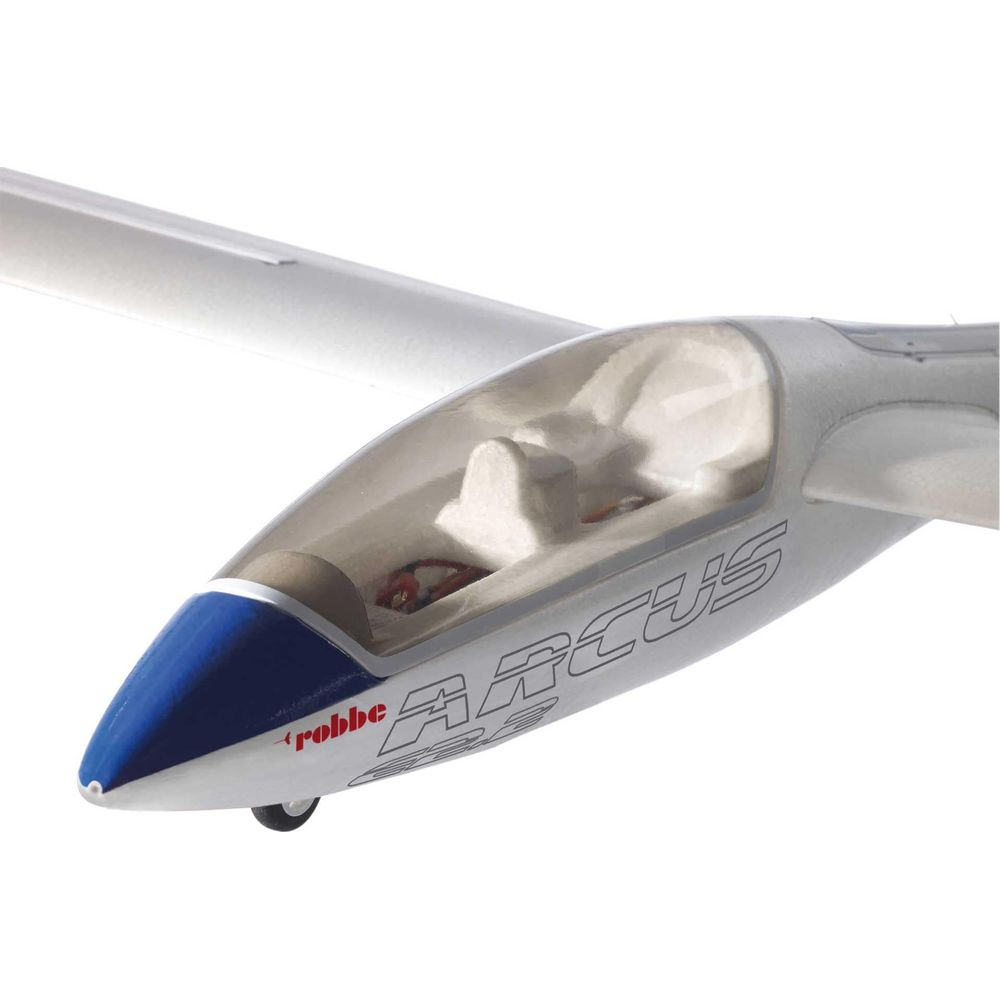 Un planeur blanc avec un nez bleu et un cockpit transparent.