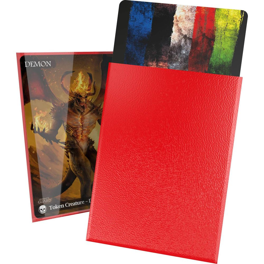 Un porte-cartes rouge avec une carte de démon et une carte à rayures colorées.