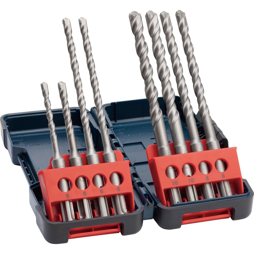 Un set di punte per muratura in una valigetta blu con inserti rossi.