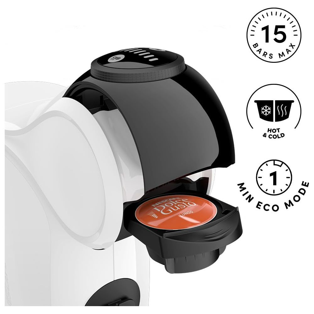 Eine weiße und schwarze Kaffeemaschine mit einer orangefarbenen Kapsel.