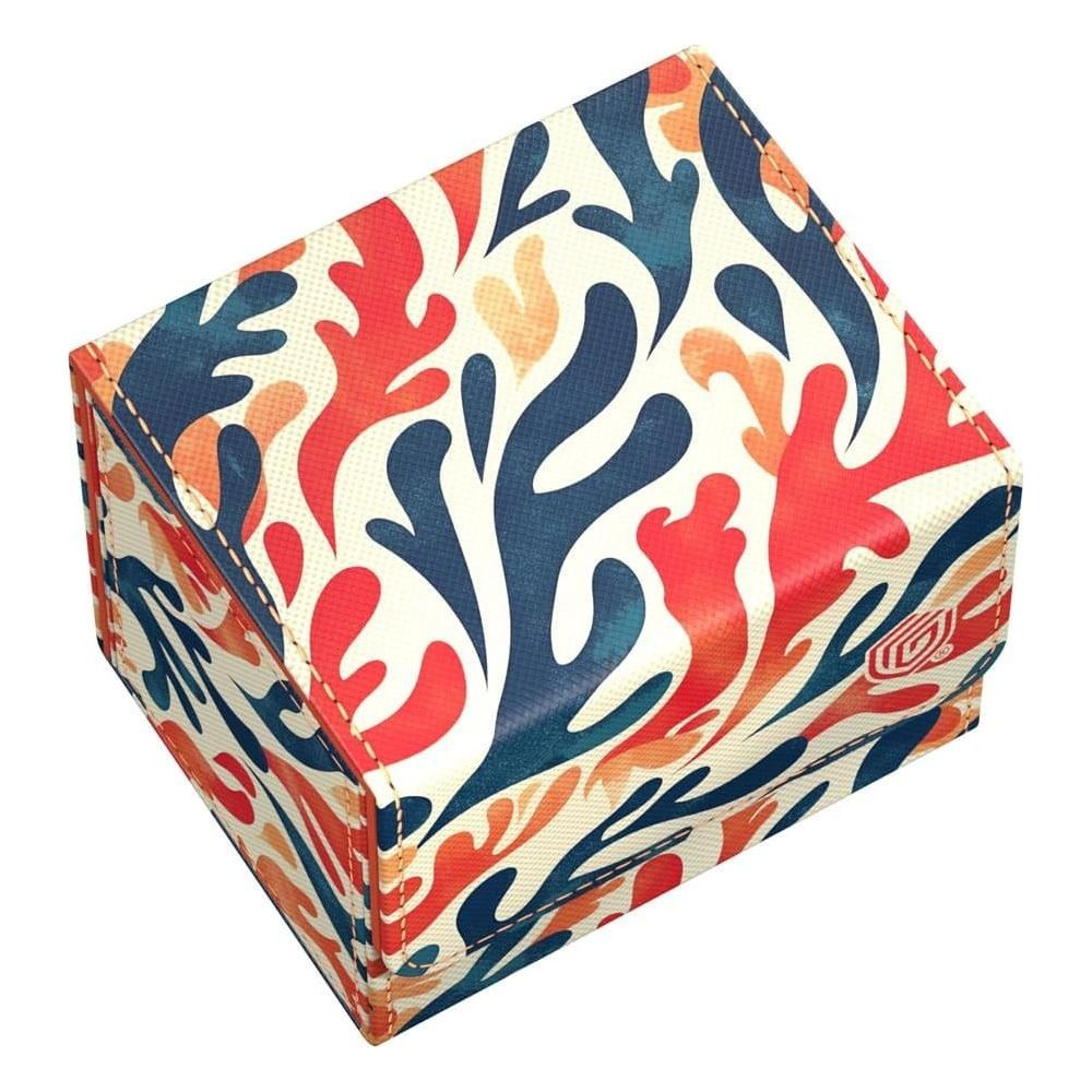Una scatola colorata con motivo corallo rosso, blu e arancione su sfondo bianco.