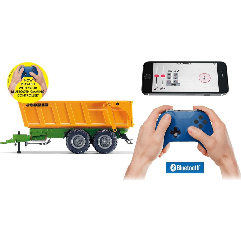 Ein Spielzeuganhänger mit einem Smartphone und einem Controller.
