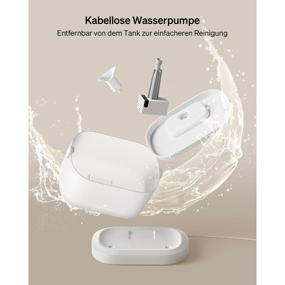 White cordless water pump with accessories and a base.