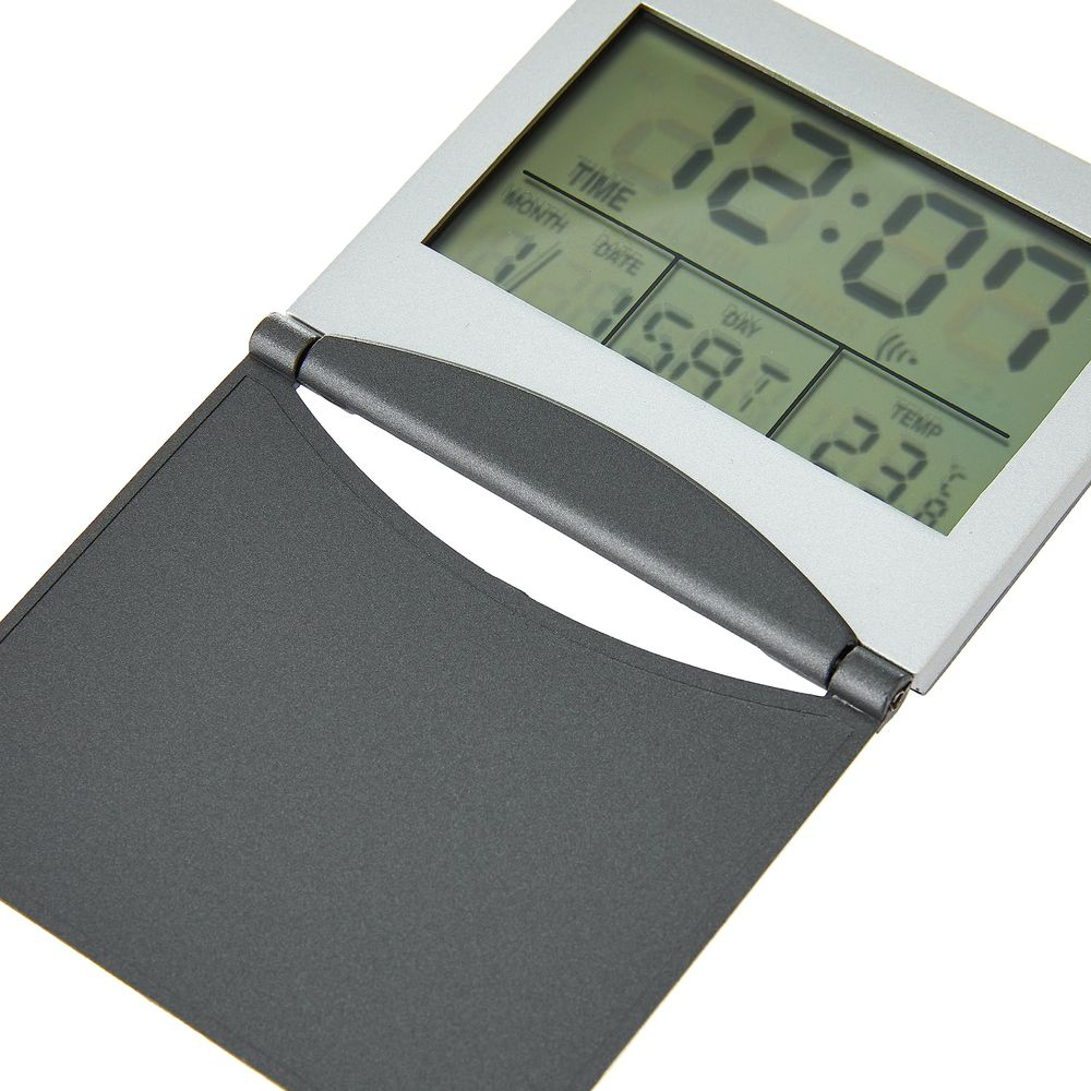 Digitaluhr mit Datum (1. Sat) und Temperatur (23°C). Zeit: 12:00.
