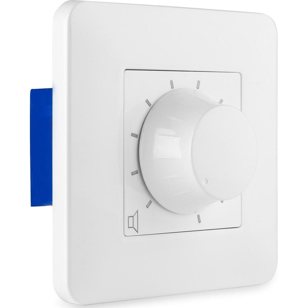 Un mando giratorio blanco con icono de altavoz y marcas en una placa de pared.