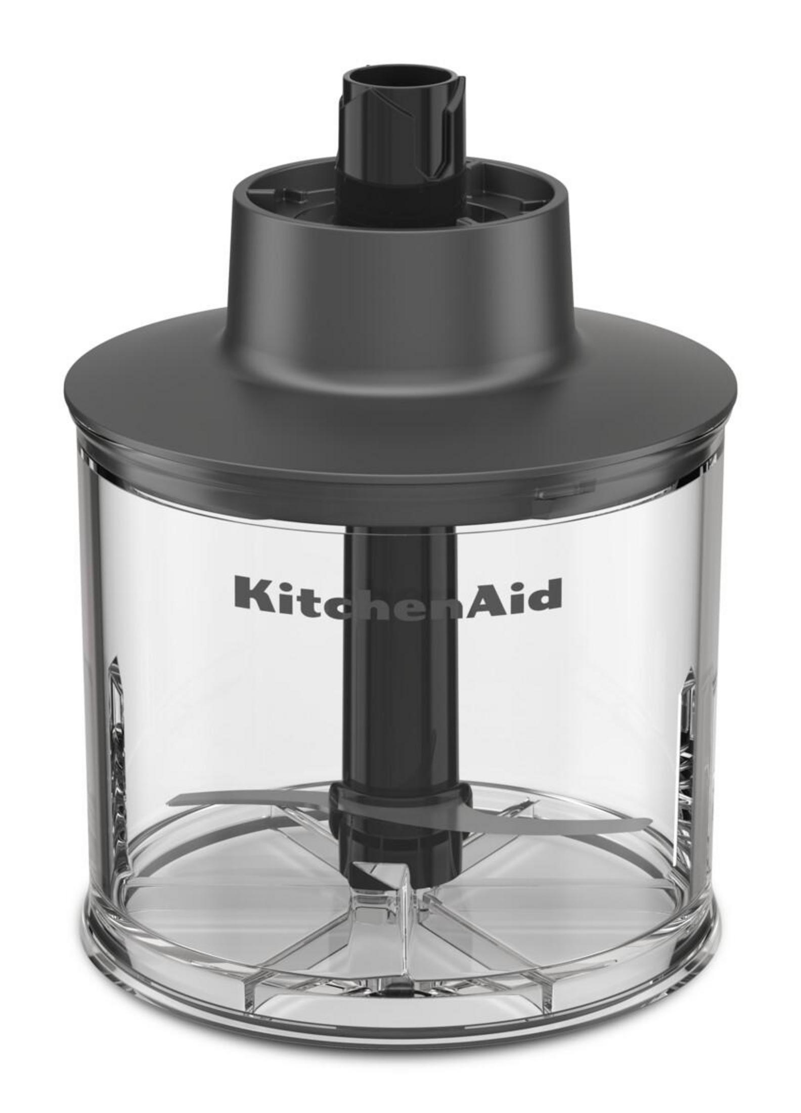 Nasadka siekająca KitchenAid z przezroczystym pojemnikiem i ostrzami.