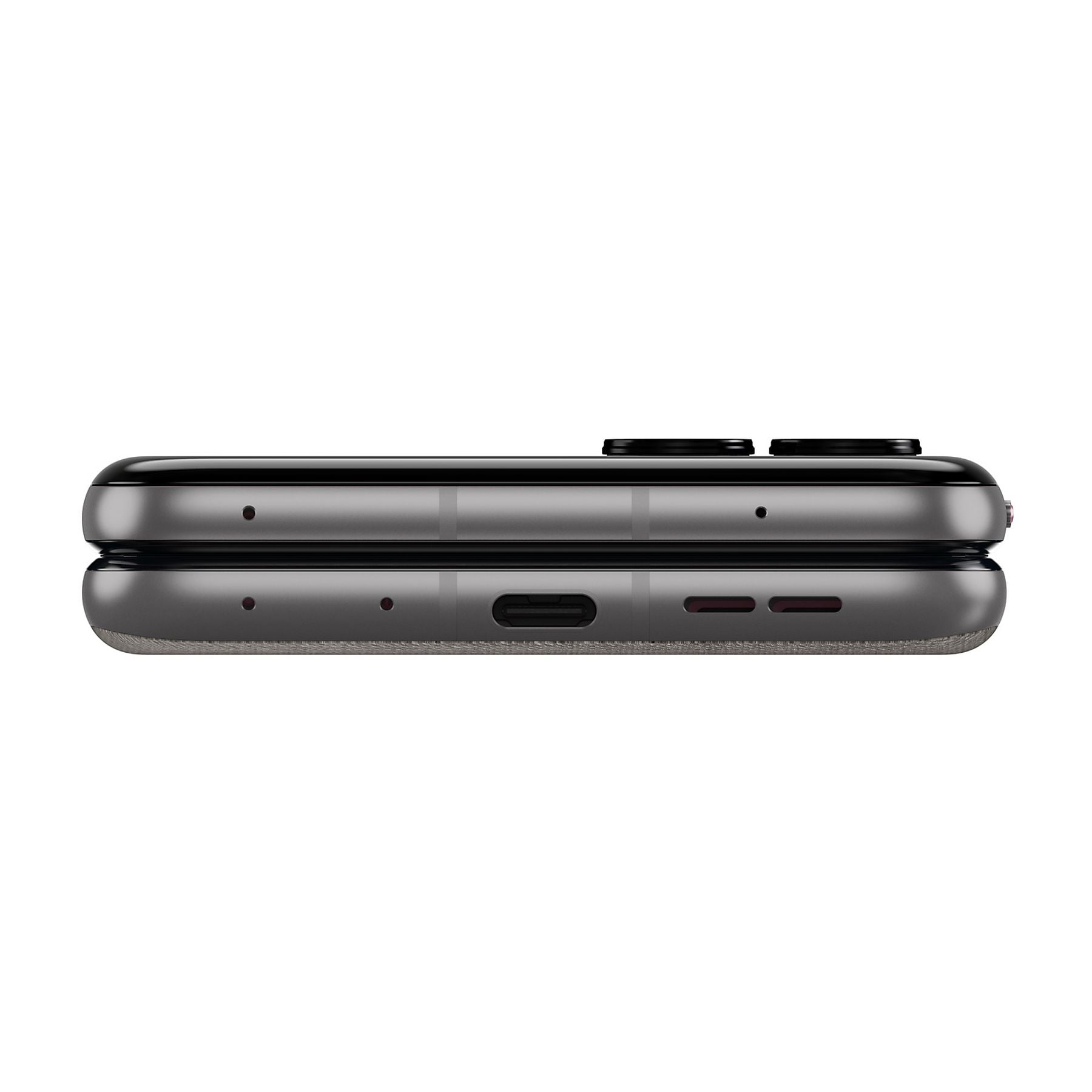 Nahaufnahme eines zusammengeklappten Smartphones, das auf der Seite liegt. Der USB-C-Anschluss ist sichtbar.