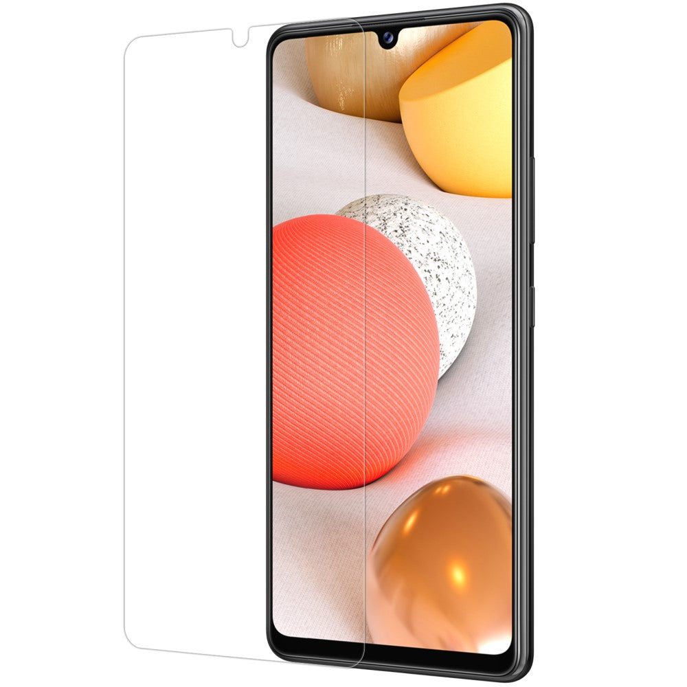 Un protecteur d'écran sur un smartphone avec des boules colorées en arrière-plan.