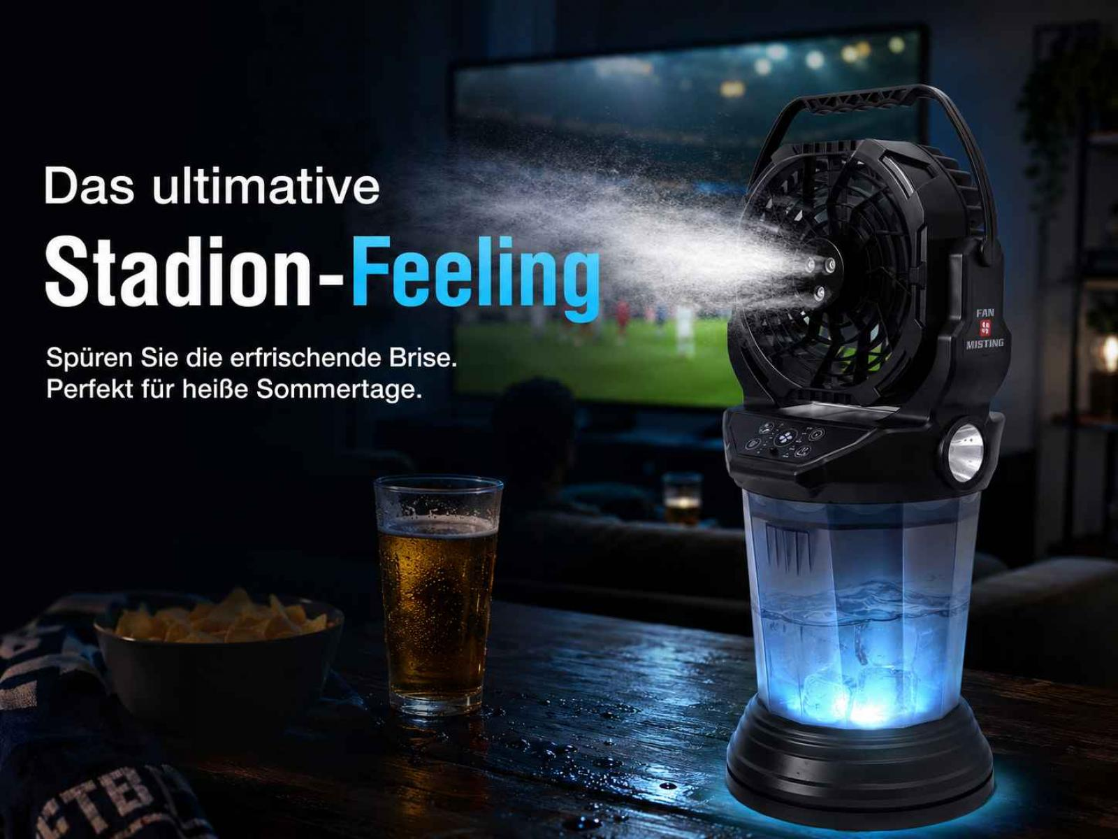 Ein schwarzer Ventilator mit Nebelfunktion sprüht Wasser vor einem Fernseher.