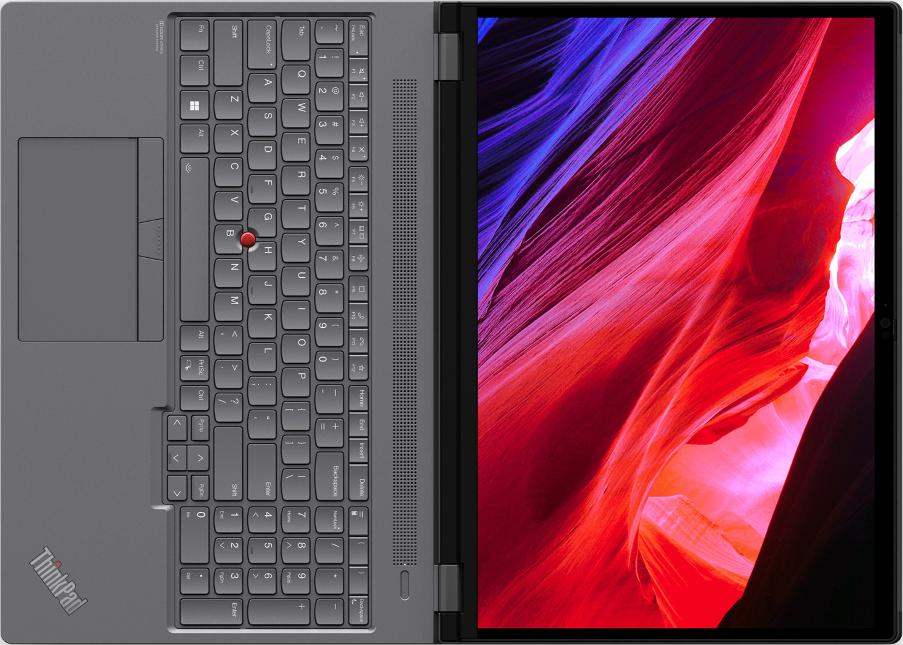 Ein geöffneter Laptop mit einer Tastatur und einem Bildschirm, der ein farbenfrohes Muster zeigt.