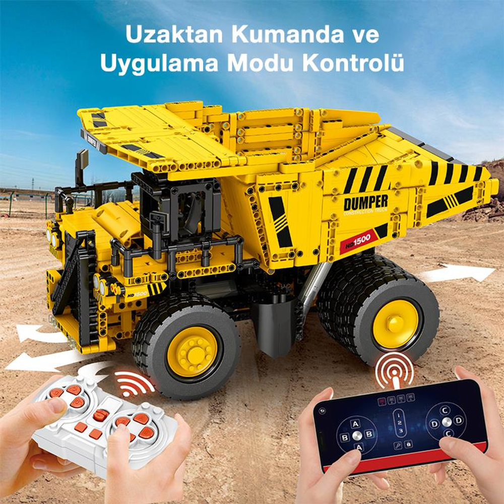 Uzaktan kumandalı ve uygulamalı sarı inşaat kamyonu, kumlu zeminde.
