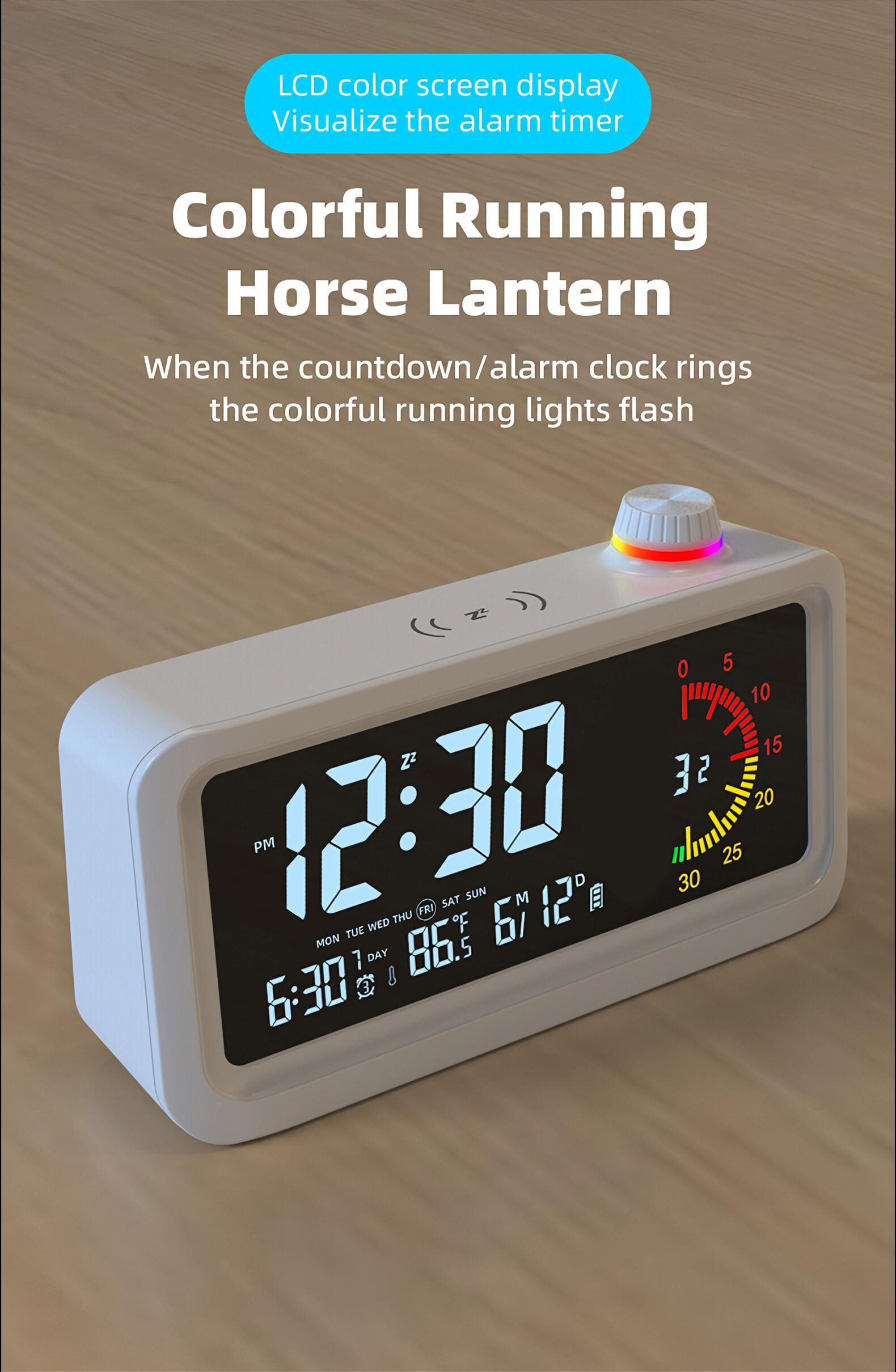 Ein weißer digitaler Wecker zeigt 12:30 und 6:30 an. Oben leuchtet ein bunter Ring.