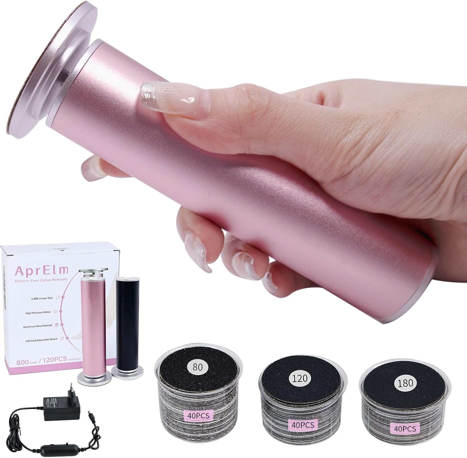 Pinker elektrischer Hornhautentferner mit Zubehör: Box, Gerät, Ladegerät und Schleifscheiben.
