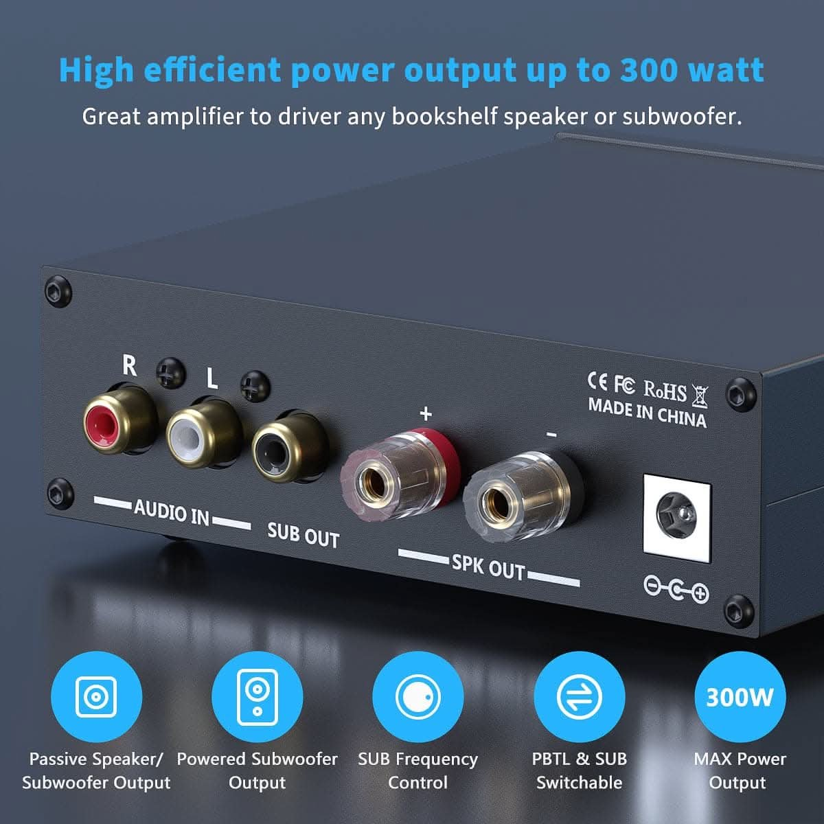 Rear panel of a black amplifier showing audio in, sub out, spk out, and power input.