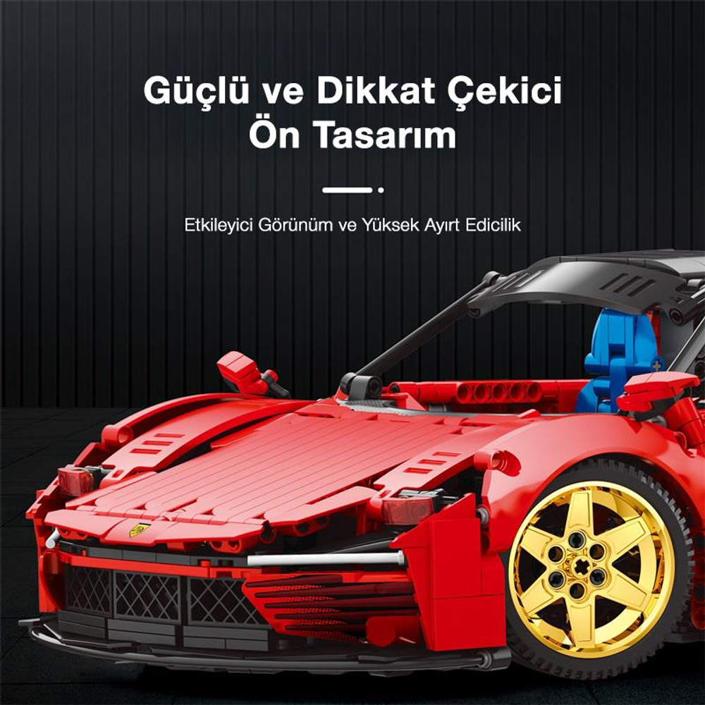 Siyah arka plan üzerinde altın jantlı kırmızı oyuncak spor araba.
