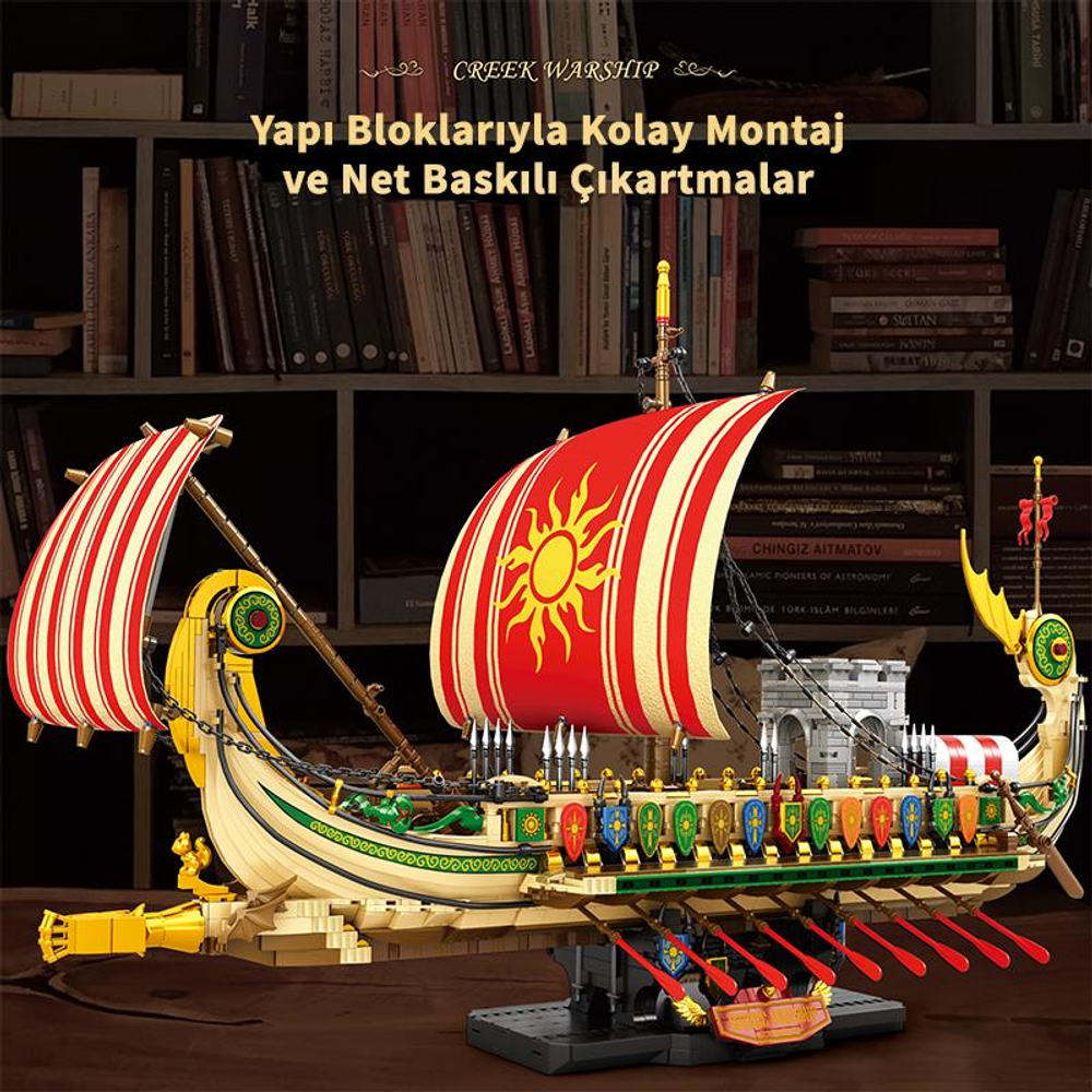 Kırmızı ve beyaz yelkenli, antik bir Yunan savaş gemisinin detaylı modeli.