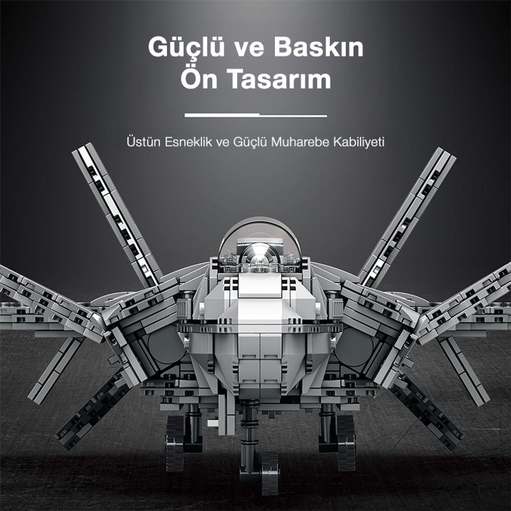 Açık kanatlı ve iniş takımlı gri, bloklu bir savaş uçağı modeli.