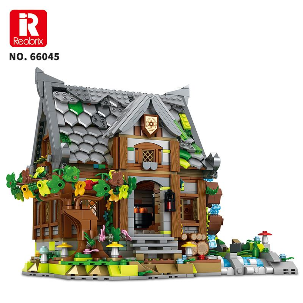 Yanında ağaç ve şelale bulunan ahşap bir evin Lego modeli.