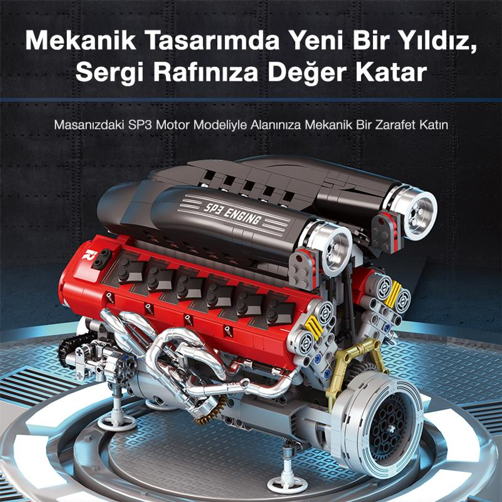 Gümüş borulu, kırmızı ve siyah V8 motor modelinin detaylı görüntüsü.