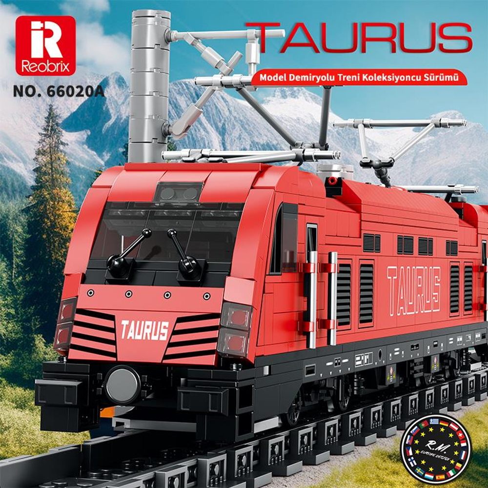 Kırmızı bir Taurus model lokomotif, arkasında dağlar olan raylarda duruyor.