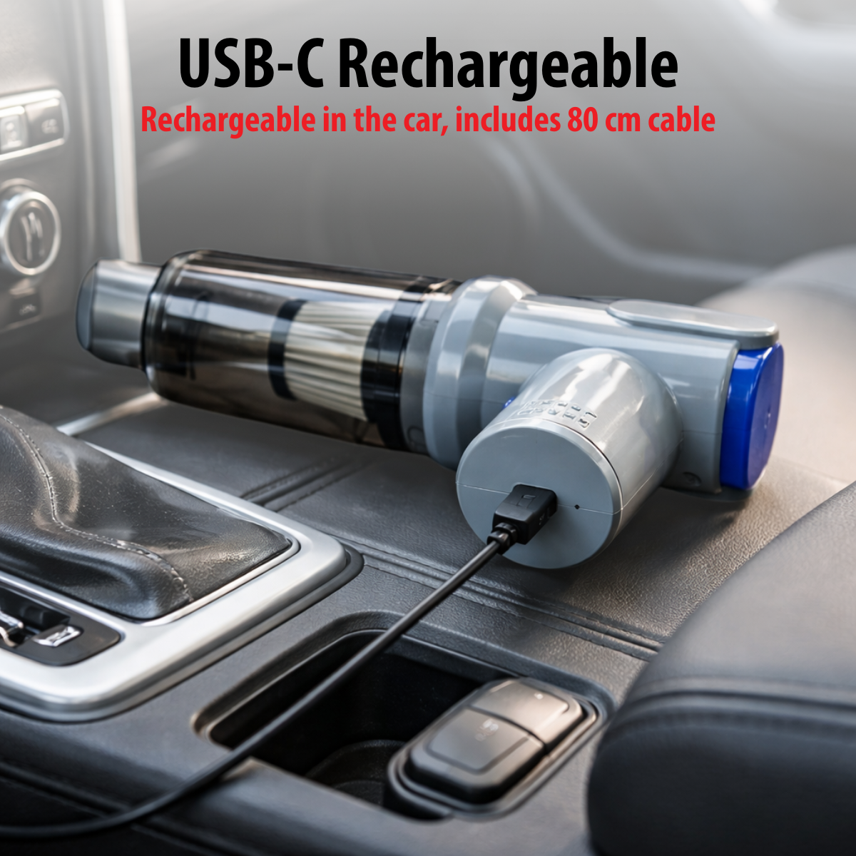 Gray and blue USB-C vacuum charges in car with black cable.