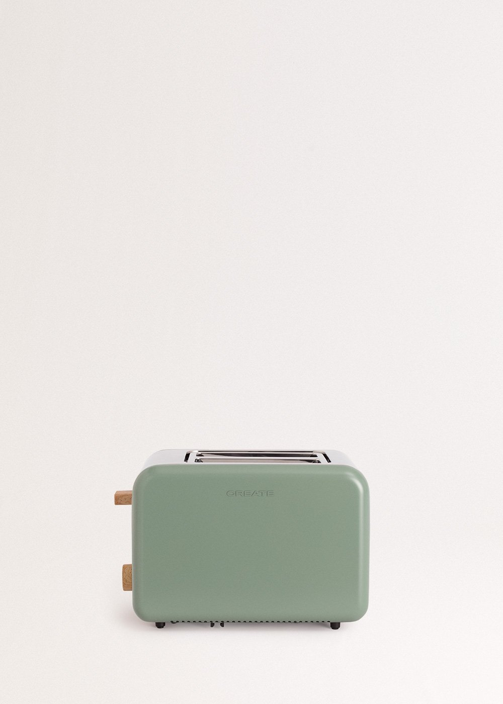 Una tostadora verde con detalles de madera sobre fondo blanco.