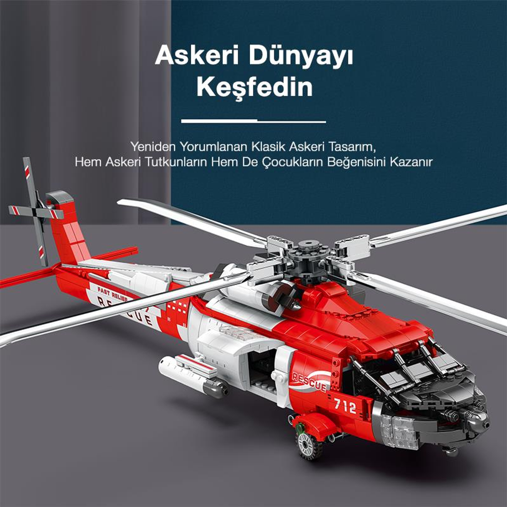 Üzerinde "RESCUE" ve "712" yazan kırmızı ve beyaz oyuncak helikopter.