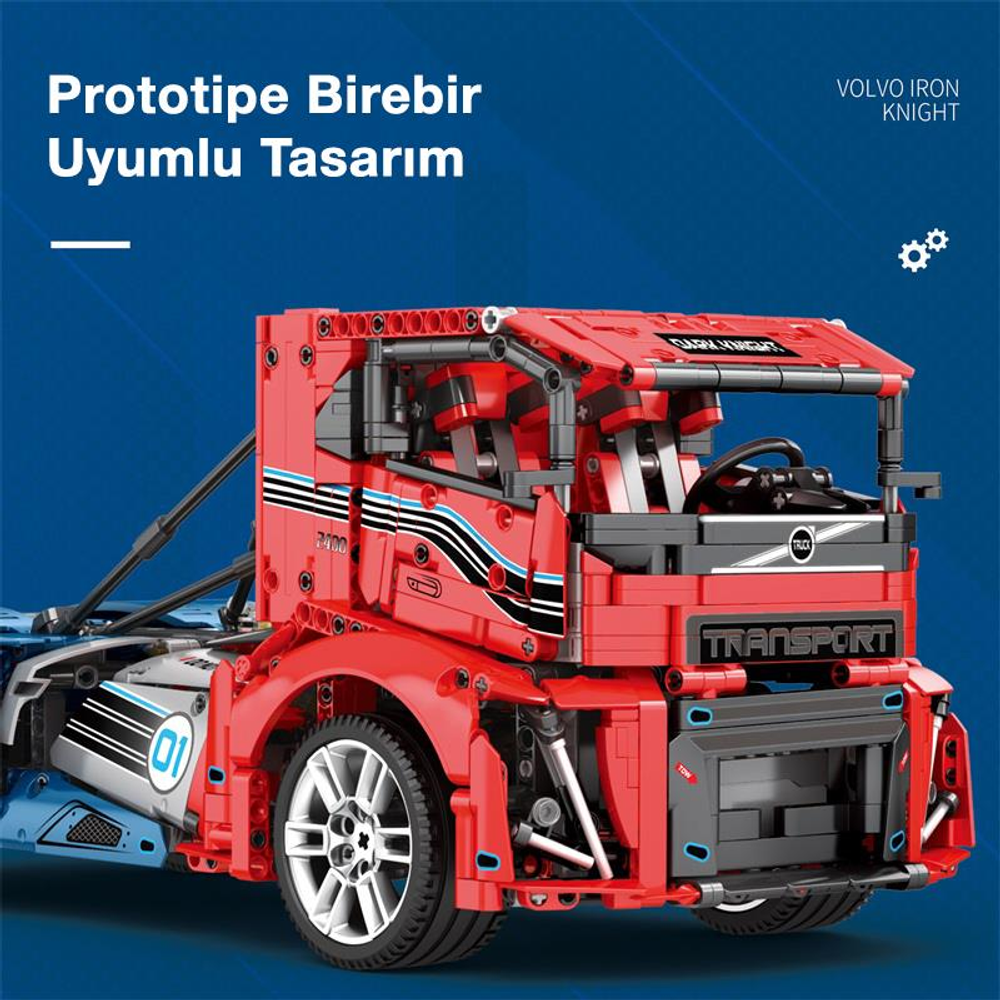 Detaylı tekerlekleri ve çıkartmaları olan kırmızı bir yapı taşı oyuncak kamyon.