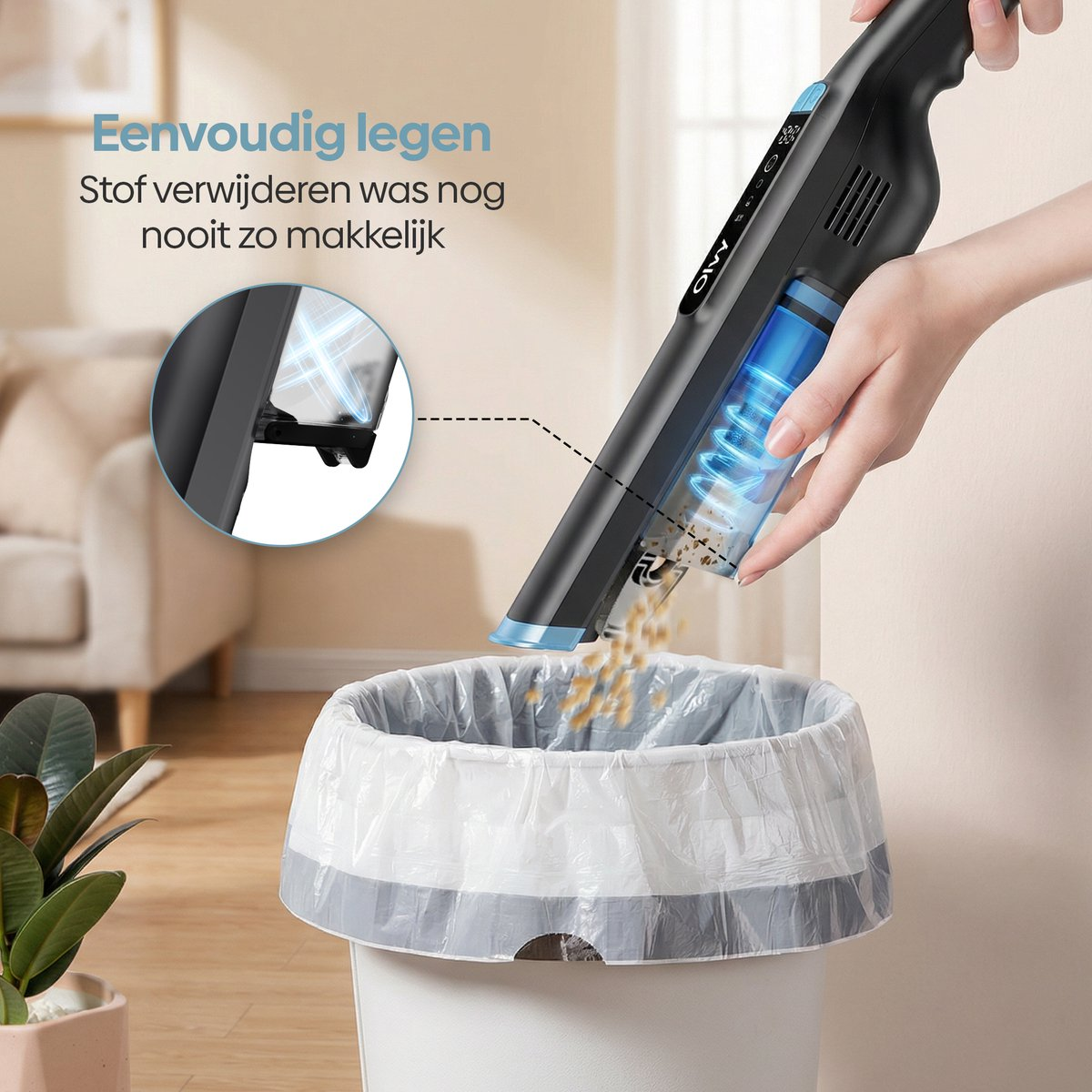 Een zwarte handstofzuiger leegt de bak in een prullenbak met zak.