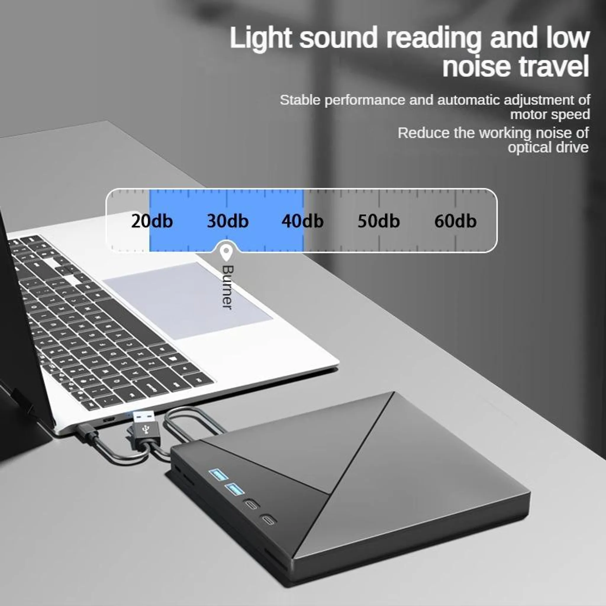Ein Laptop wird an ein schwarzes optisches Laufwerk angeschlossen. Ein dB-Meter zeigt 20db.
