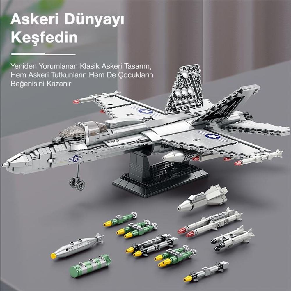 Yerde çok sayıda füze bulunan bir stant üzerinde gri Lego savaş uçağı.