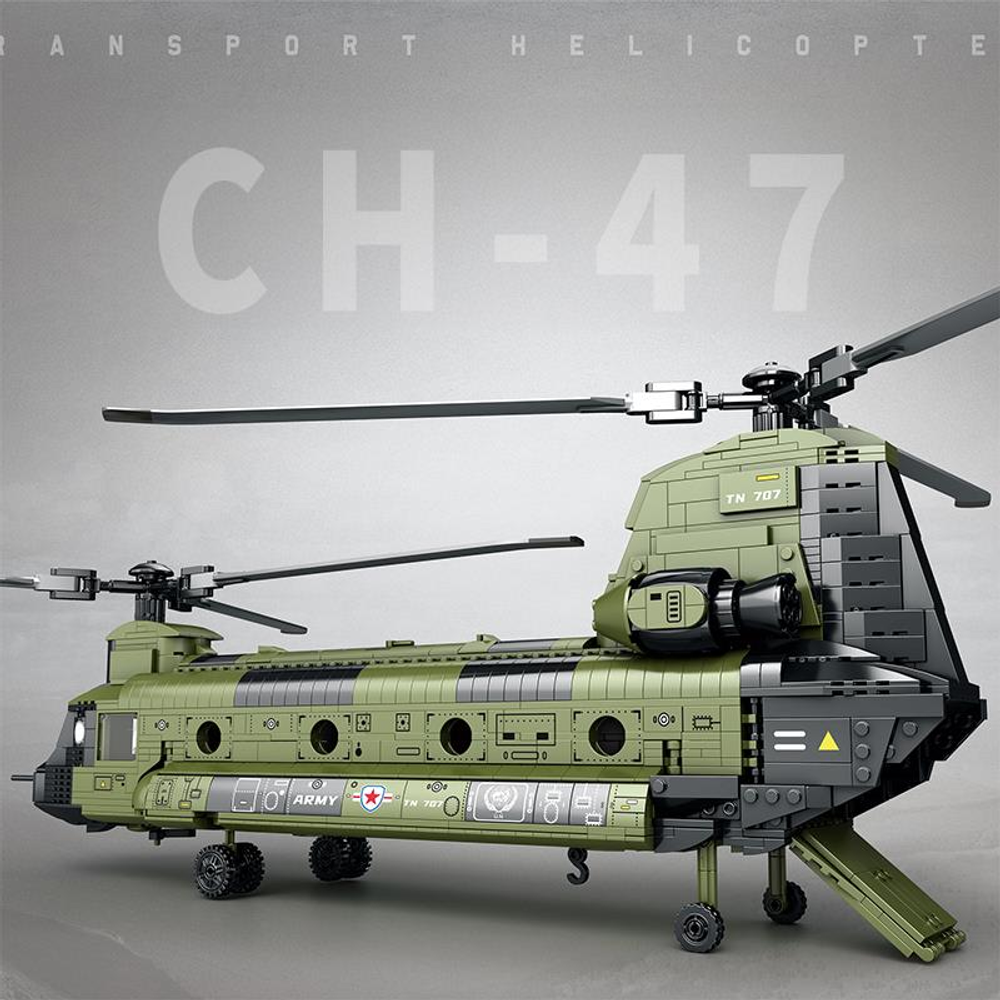 İki rotorlu ve tekerlekli yeşil oyuncak CH-47 helikopter.