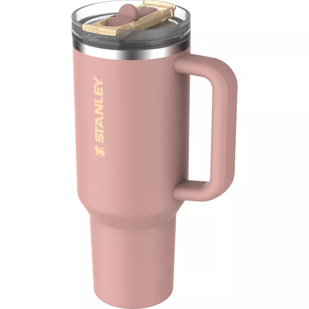 Pembe renkli, saplı ve şeffaf kapaklı Stanley matarası.