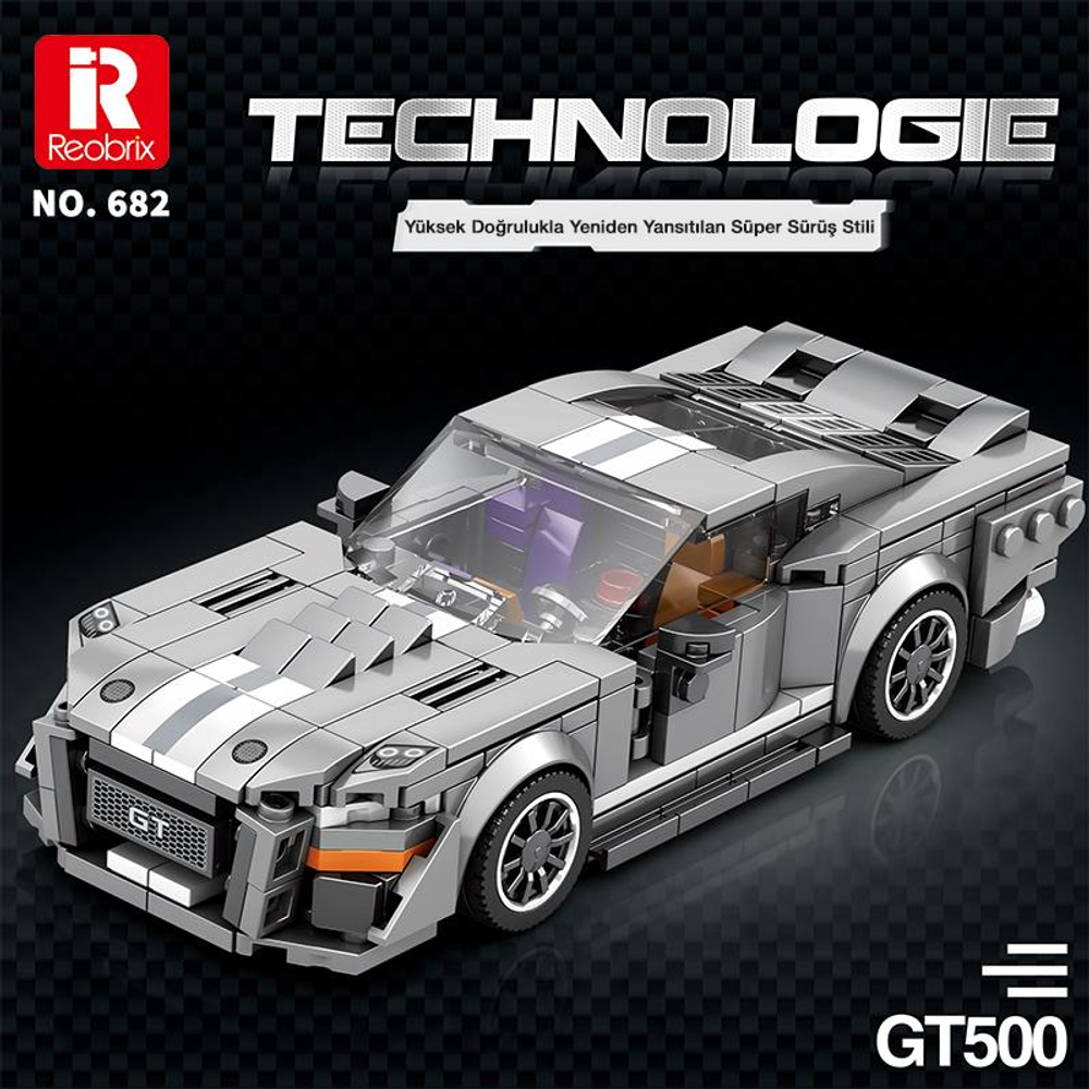 Beyaz çizgili ve turuncu vurgulu gri Lego spor araba modeli.