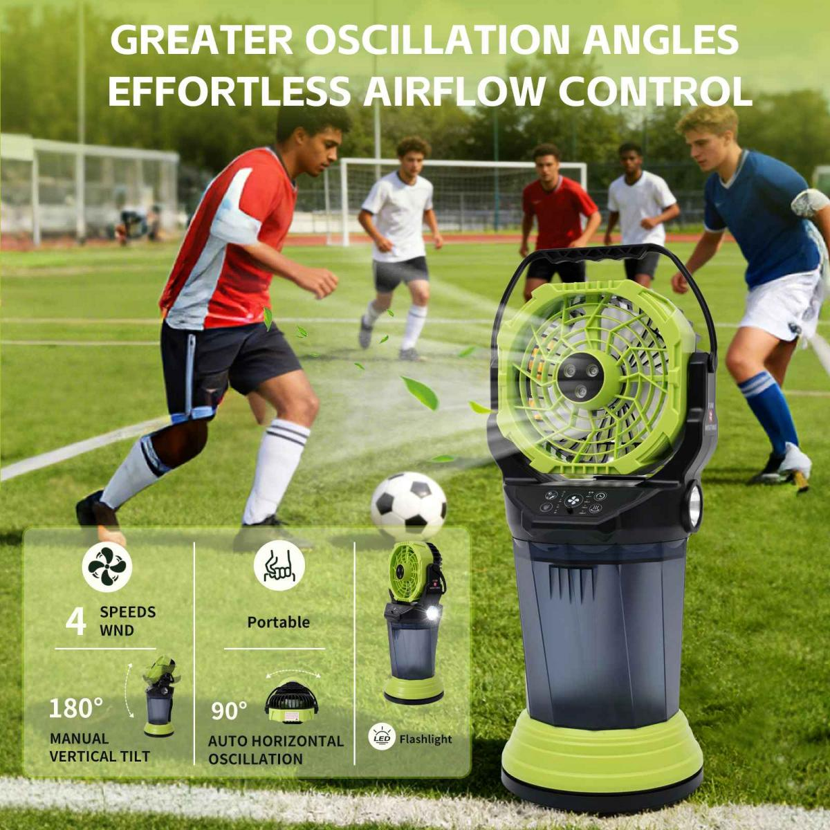 Ein tragbarer Ventilator mit LED-Licht auf einem Fußballfeld mit spielenden Fußballern.