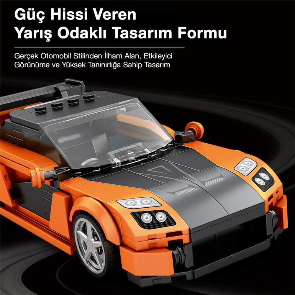 Detaylı tasarıma sahip turuncu ve siyah Lego yarış arabası.