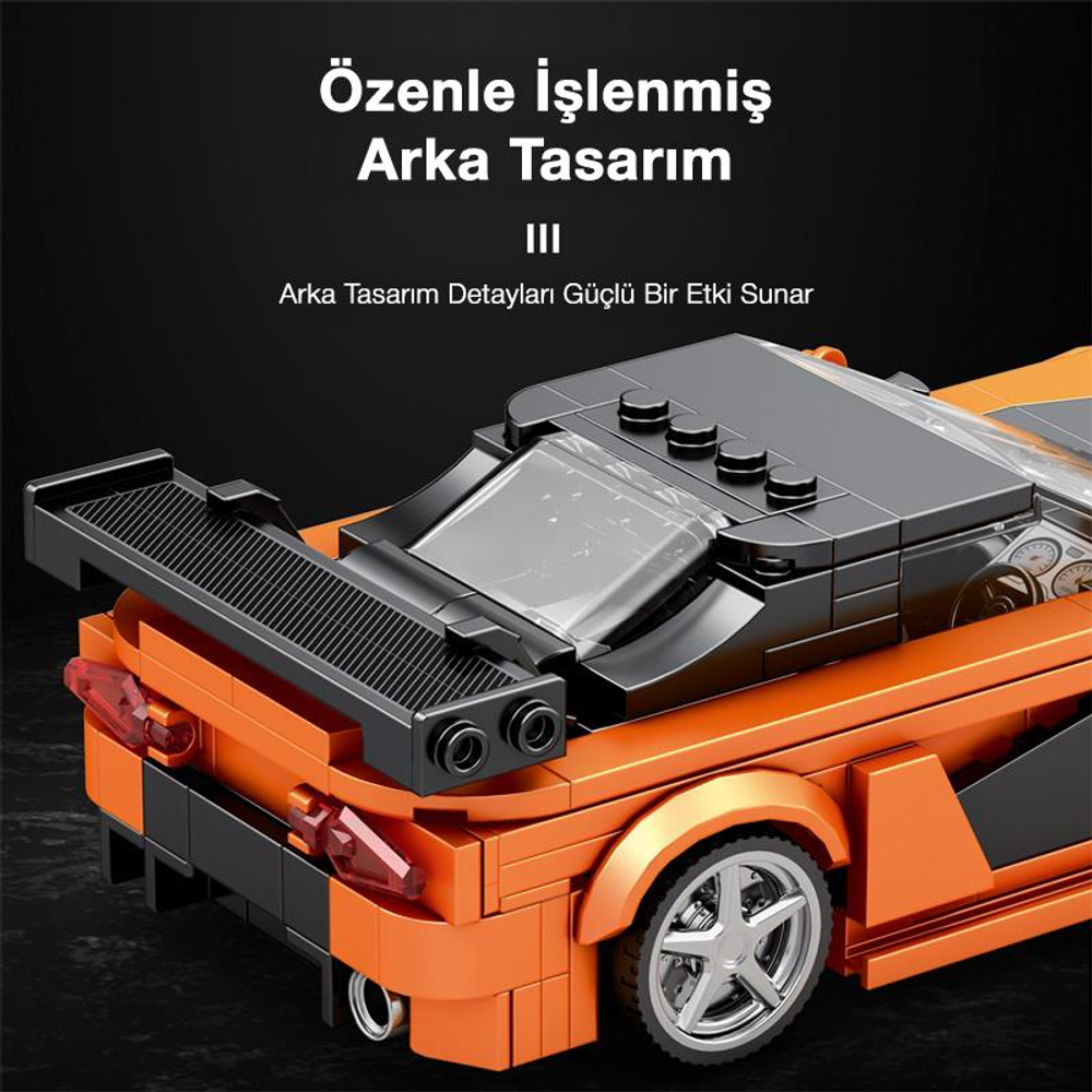 Turuncu ve siyah Lego araba modeli arka görünüm. Detaylı tasarım.