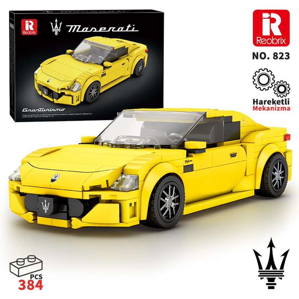 Sarı bir Maserati model araba, yanında kutusuyla birlikte.