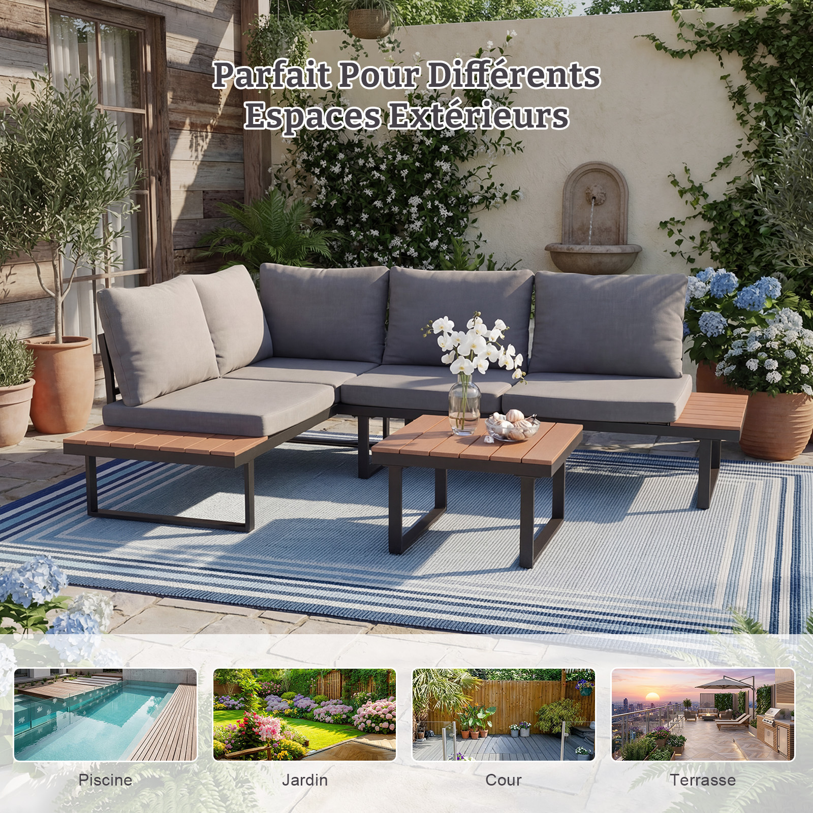 Gray sectional outdoor sofa with wooden tables on a blue and white striped rug.