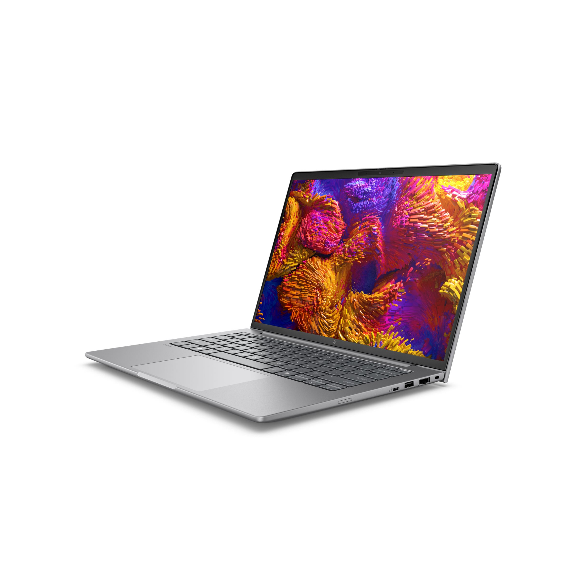 Srebrny laptop z otwartym ekranem, wyświetlający kolorowy, abstrakcyjny obraz.