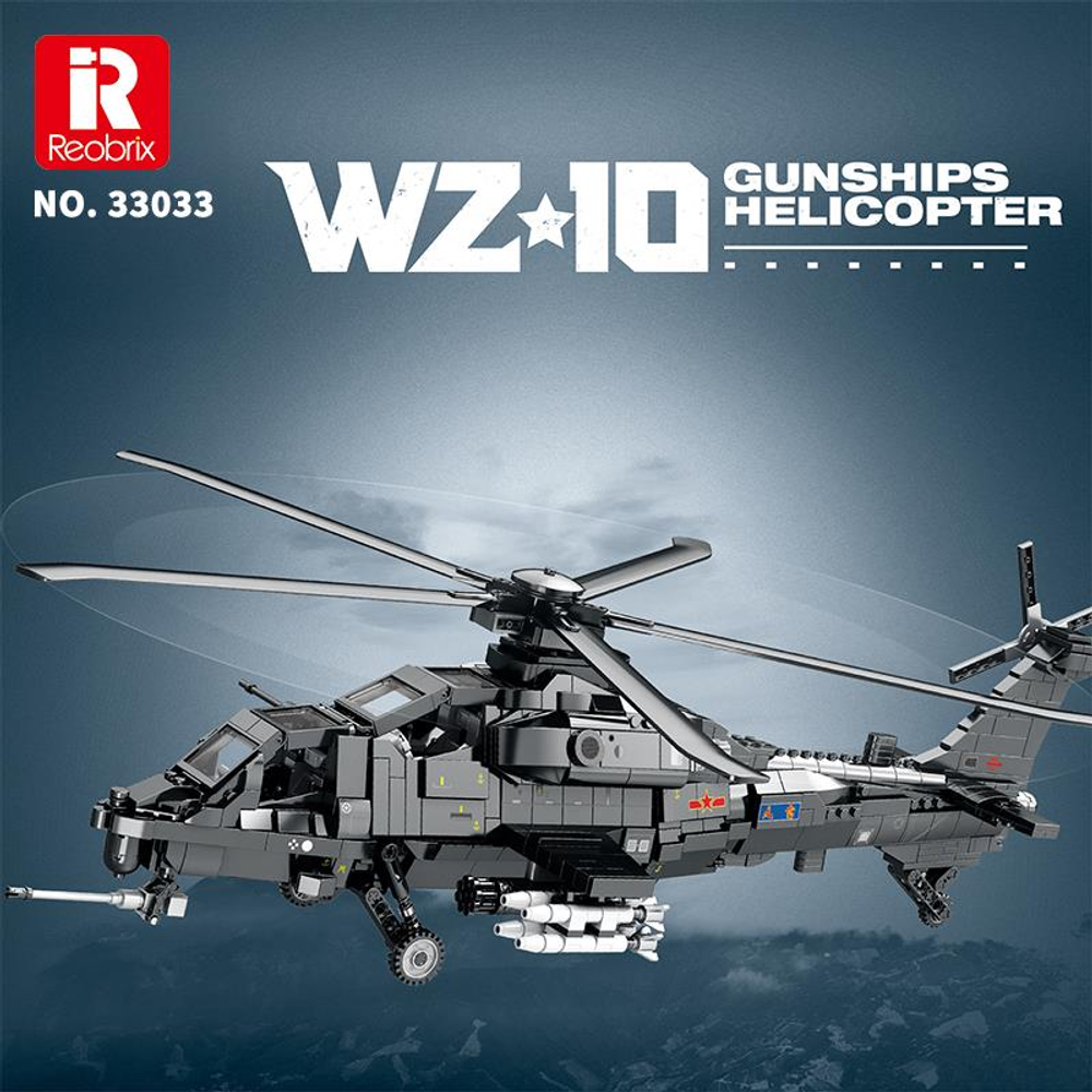Füzeli ve topçu donanımlı gri oyuncak taarruz helikopter modeli.