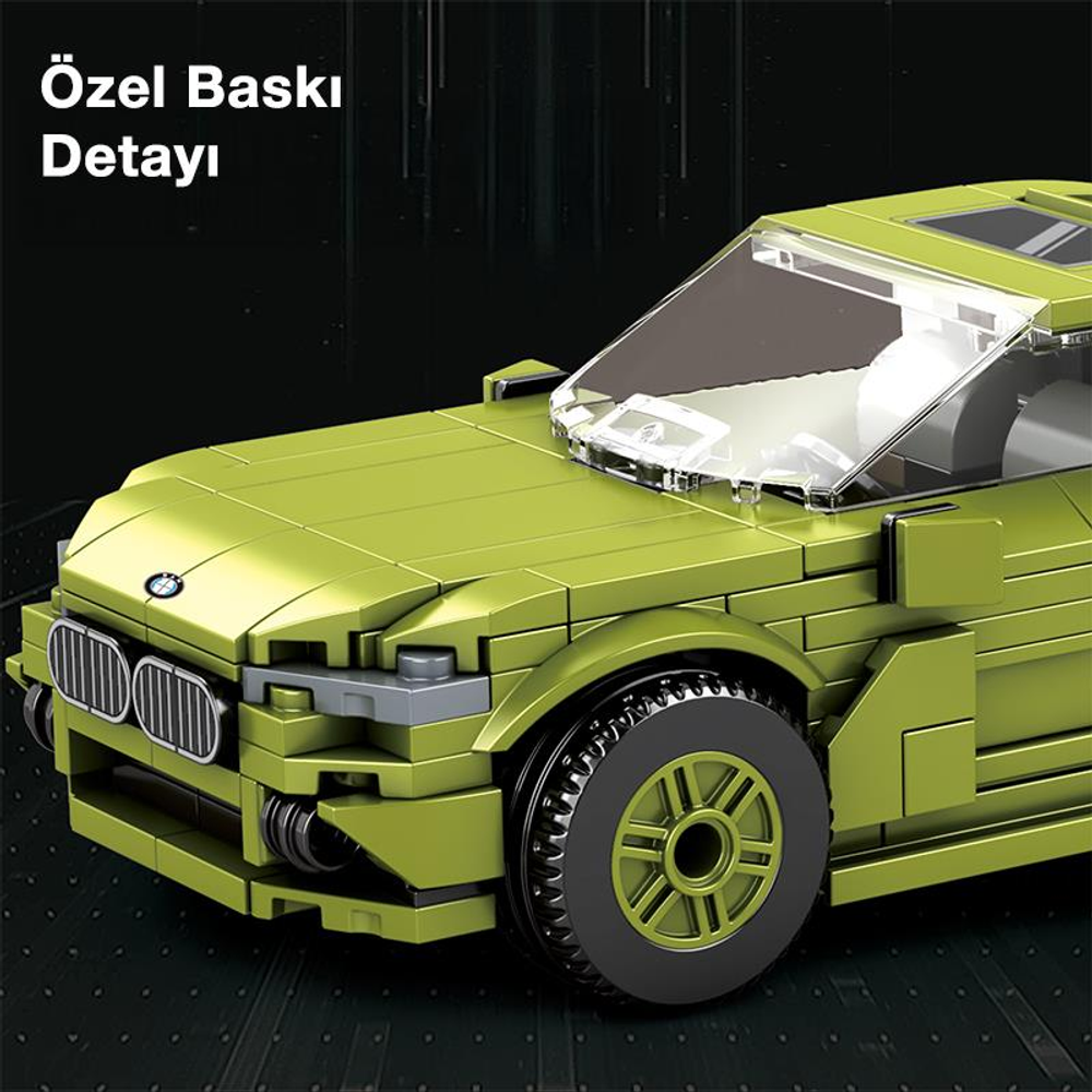 Şeffaf ön cam detaylı, yeşil tuğla model araba.