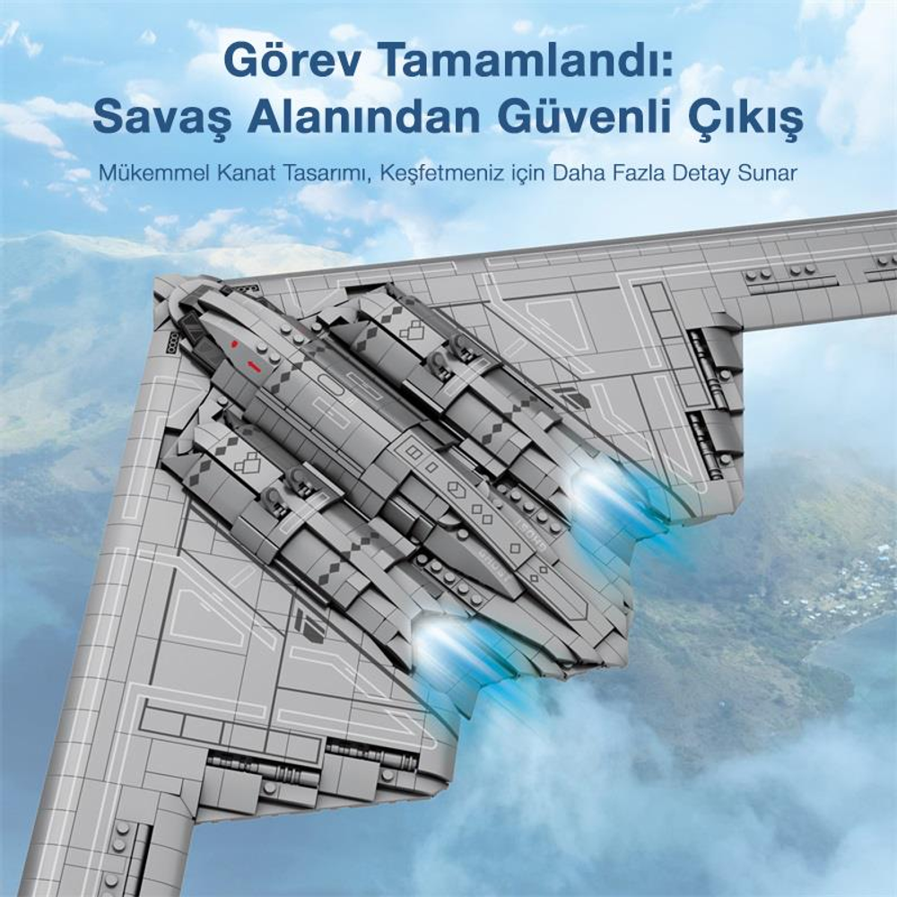 Mavi egzoz alevli gri hayalet bombardıman uçağı modeli bulutlu bir manzara üzerinde uçuyor.