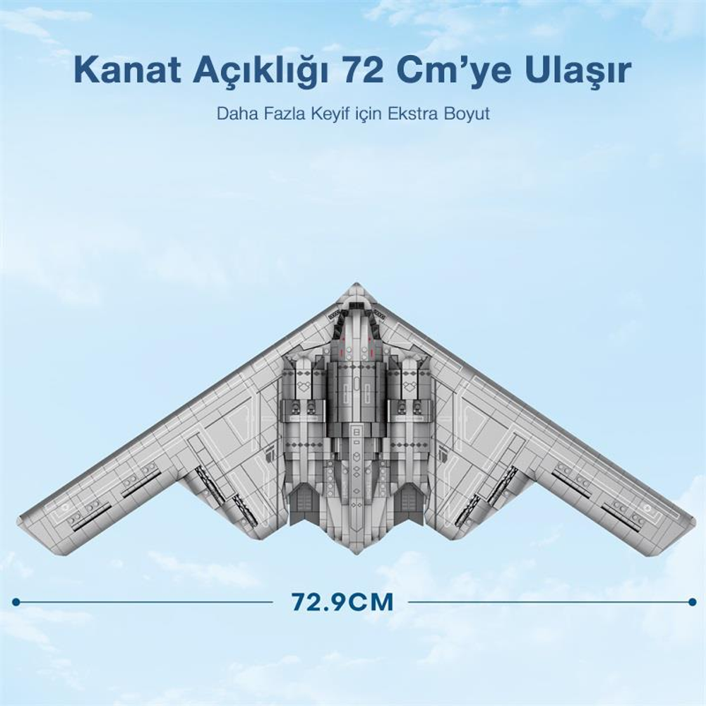 72,9 cm kanat açıklığına sahip gri hayalet uçak gökyüzü fonunda.