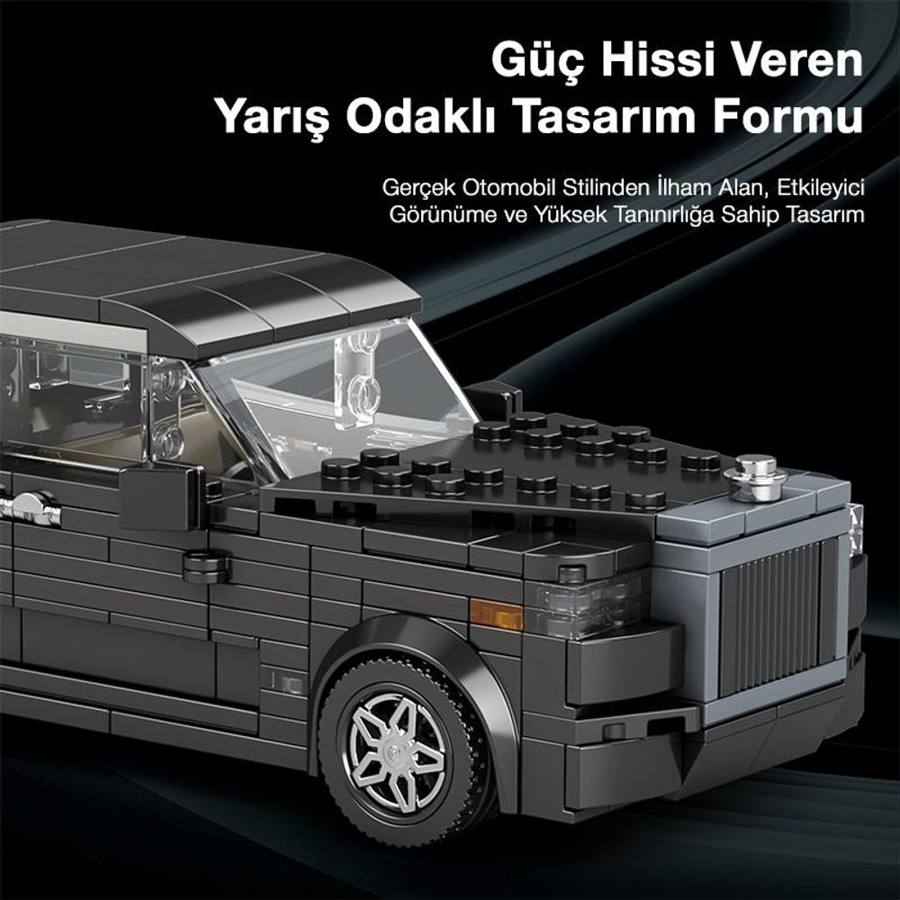 Siyah blok oyuncak araba, detaylı ön ızgara ve tekerlekler.