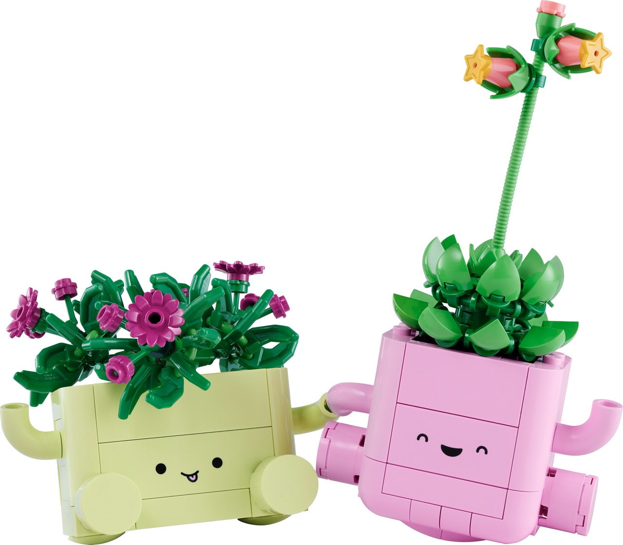 Dwa doniczki Lego z twarzami i kwiatami. Jeden jest jasnozielony, drugi różowy.