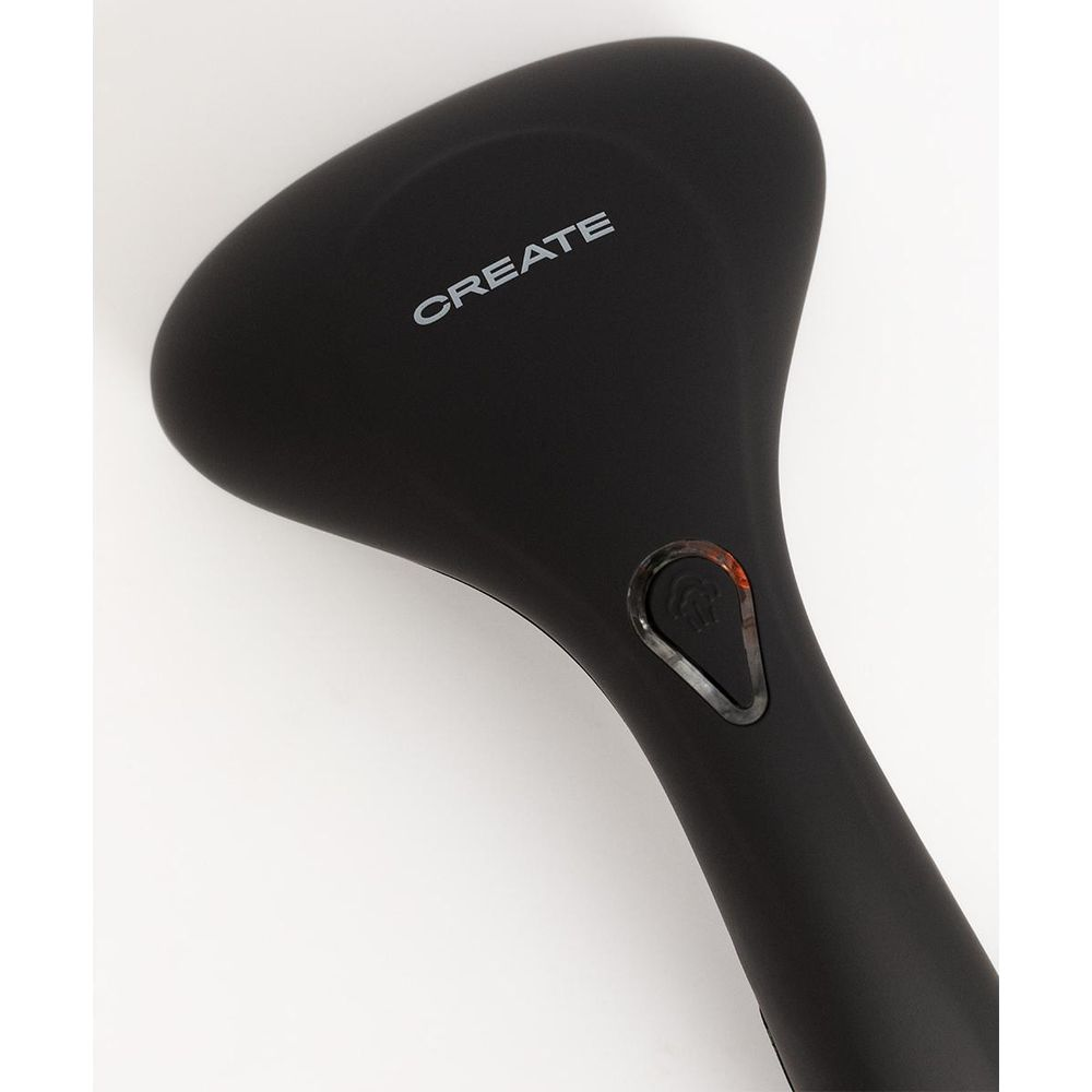 Vaporizador de ropa negro de mano con logo 'CREATE' y botón de símbolo de vapor.