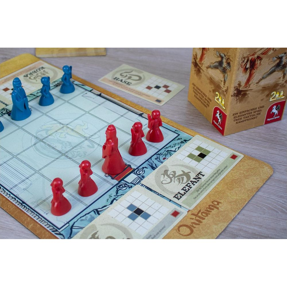 Un jeu de société avec des pièces rouges et bleues sur un plateau.