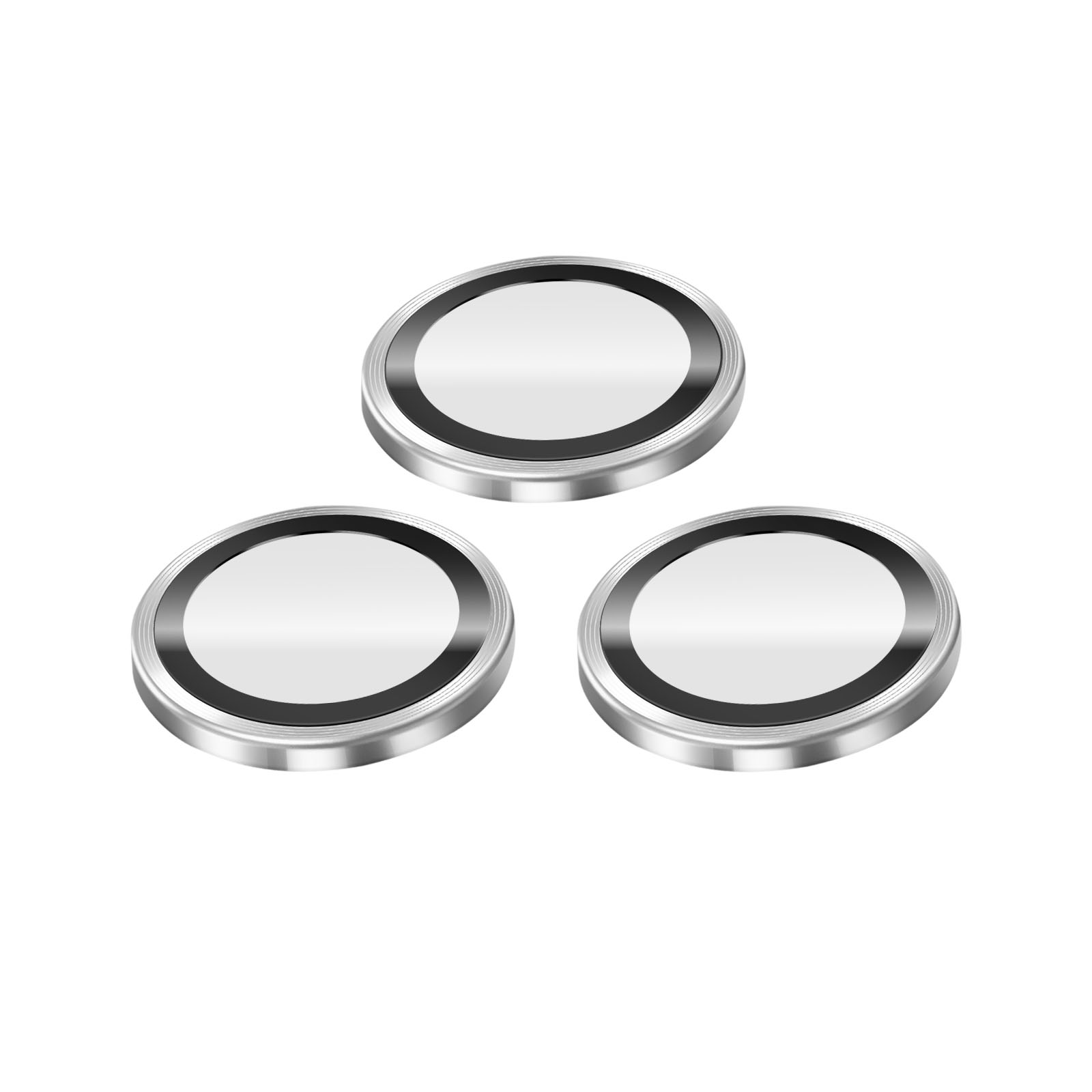 Drie zilveren ronde objecten met zwarte randen en reflecterende middelpunten.